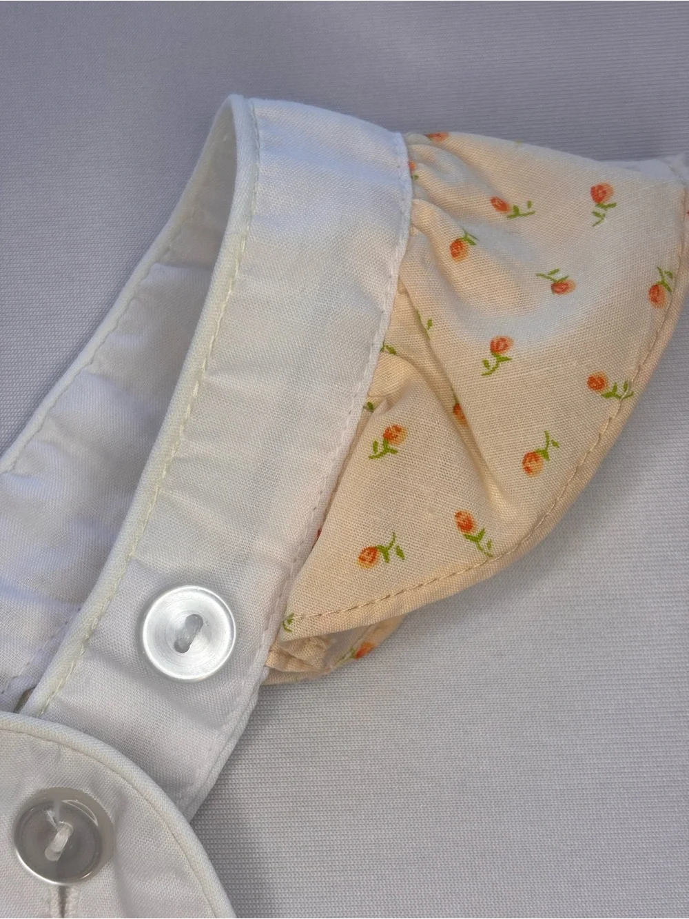 Peach Butterfly Bubble Romper with Embroidered Bib